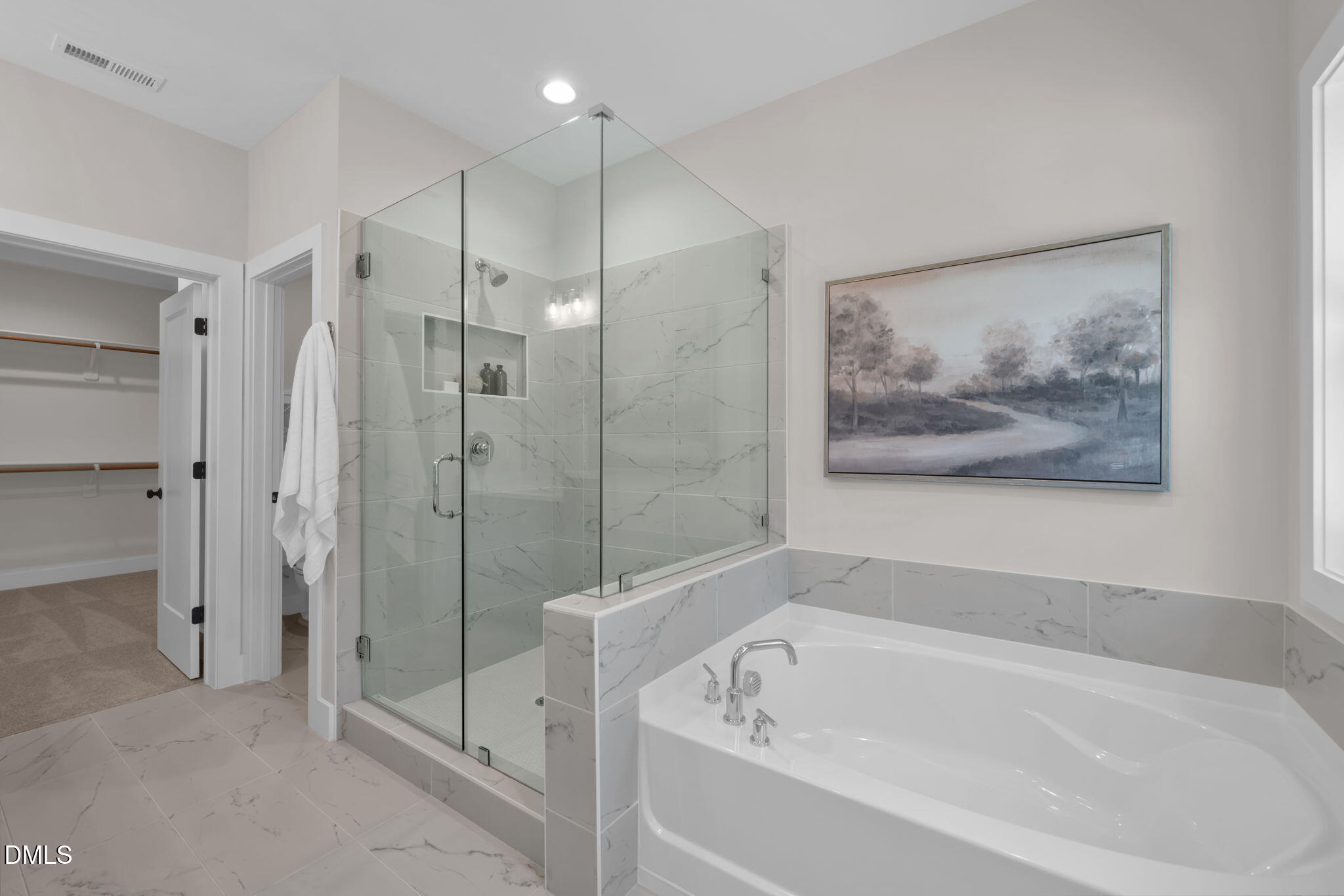 964 Double Helix Road Apex, NC 27523 - Photo 17 of 37 a bathroom with a bathtub and a shower
