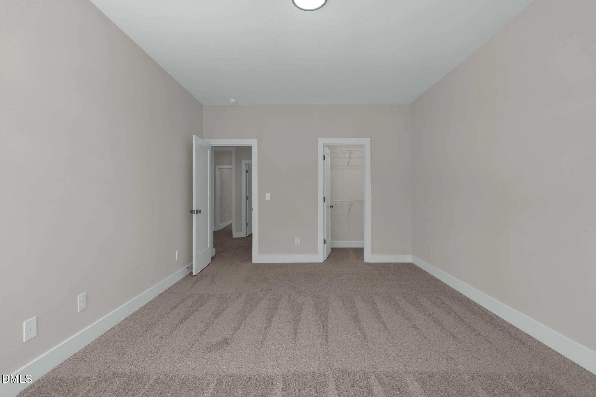 964 Double Helix Road Apex, NC 27523 - Photo 25 of 37 a view of an empty room with wooden floor