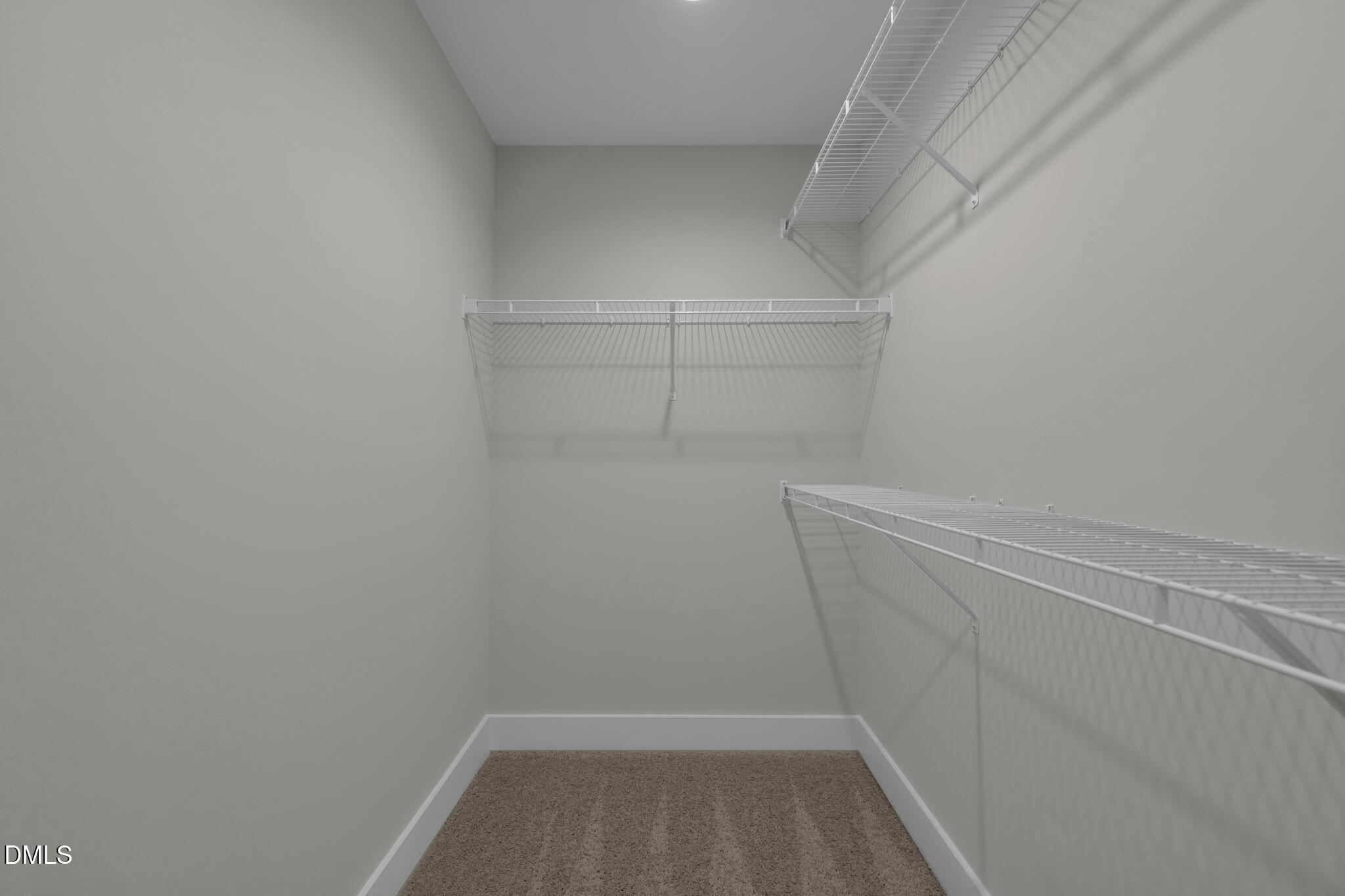 964 Double Helix Road Apex, NC 27523 - Photo 29 of 37 a view of a room with racks on the wall