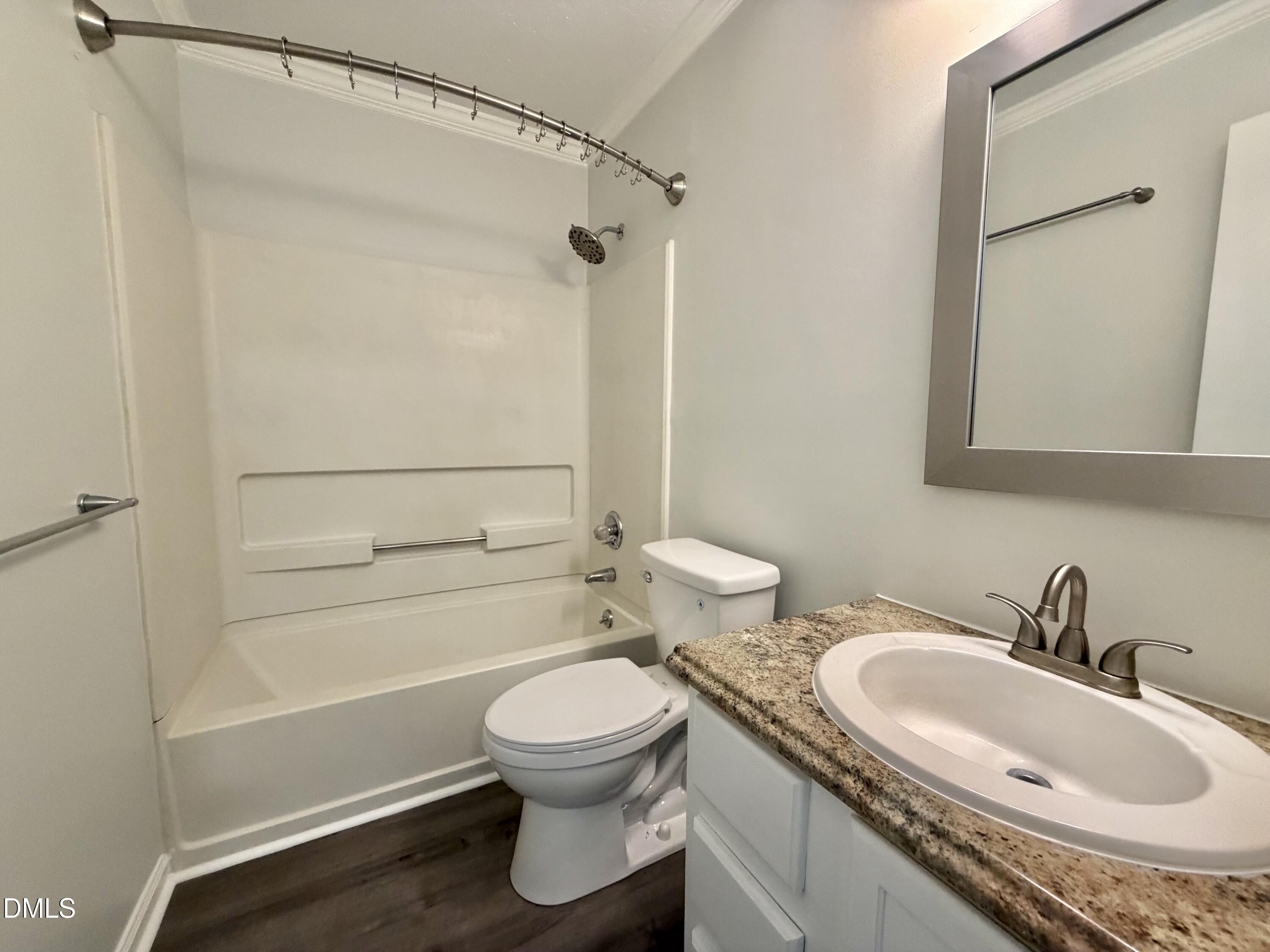 333 Jones Franklin Road, Unit B Raleigh, NC 27606 - Photo 9 of 9 a bathroom with a sink toilet and shower