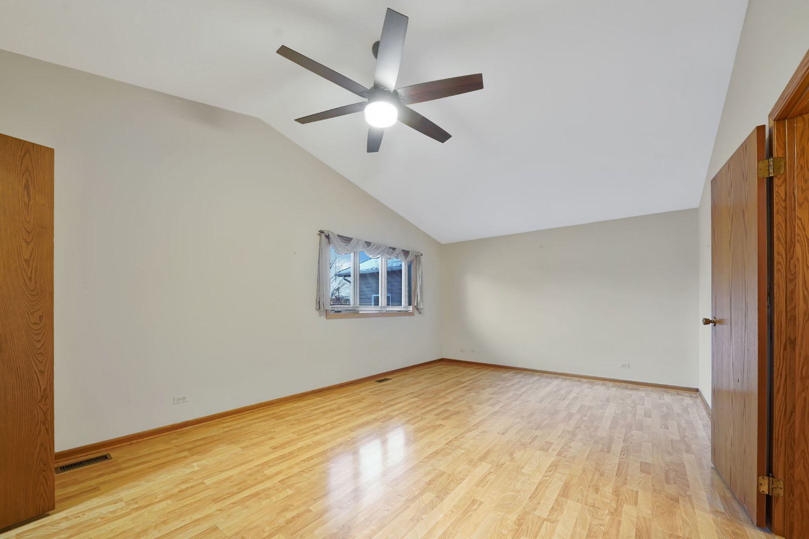 4-n040 Nugent Street Addison, IL 60101 - Photo 17 of 48 a view of empty room with wooden floor