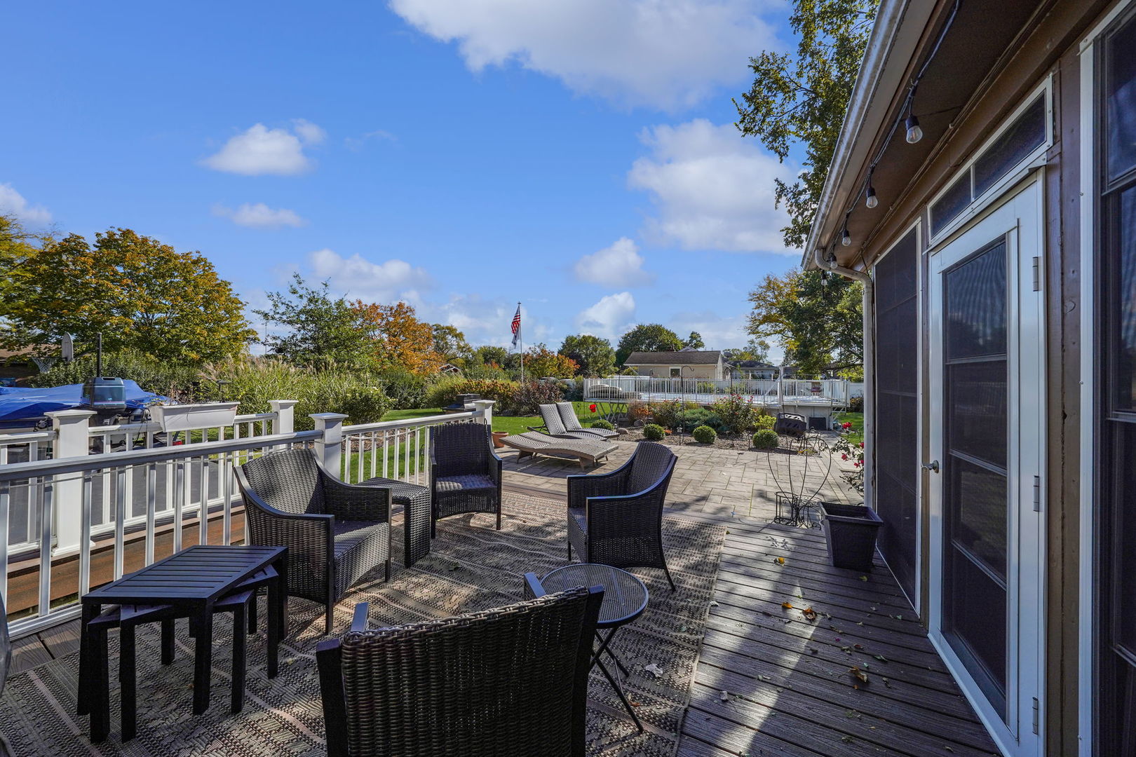 4-n040 Nugent Street Addison, IL 60101 - Photo 36 of 48 a view of a balcony with two chairs and a table