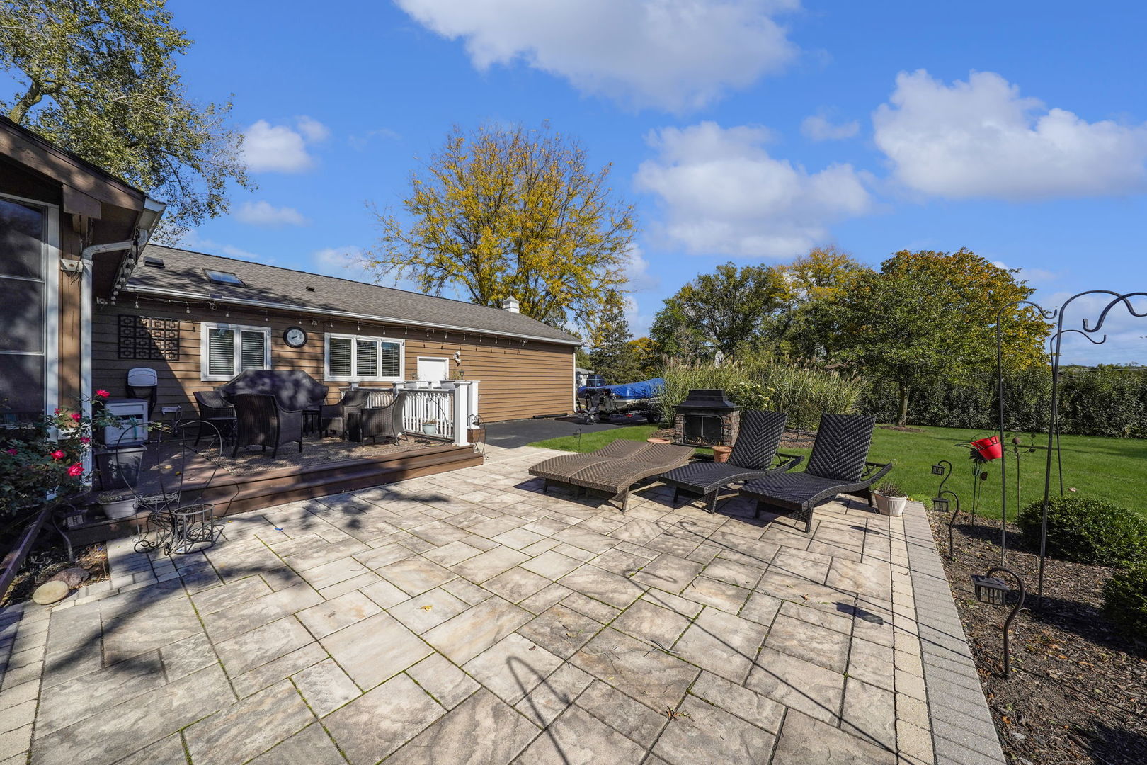 4-n040 Nugent Street Addison, IL 60101 - Photo 37 of 48 a view of a backyard with sitting area and furniture