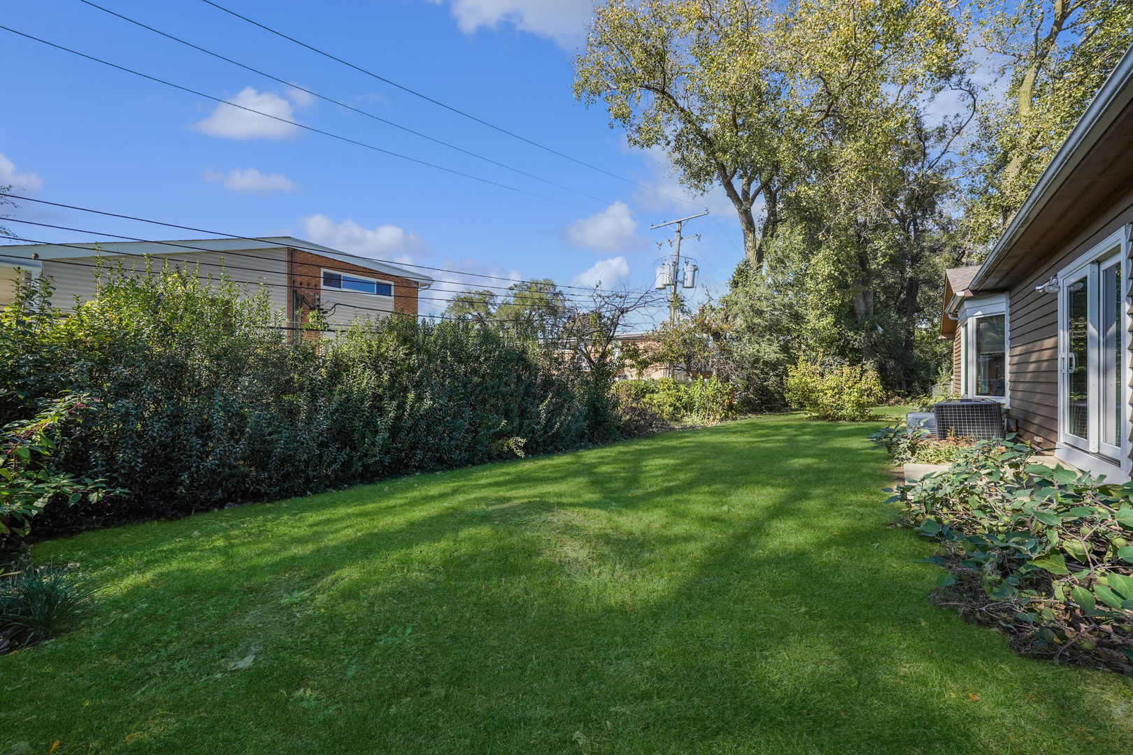 4-n040 Nugent Street Addison, IL 60101 - Photo 39 of 48 a view of a back yard of the house