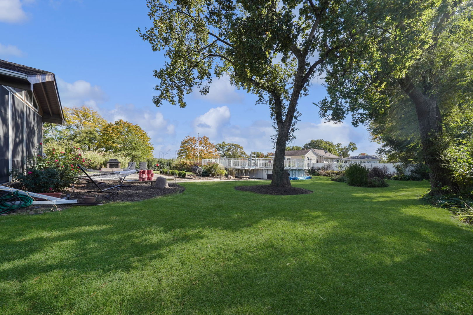 4-n040 Nugent Street Addison, IL 60101 - Photo 40 of 48 a green field with lots of trees in the background