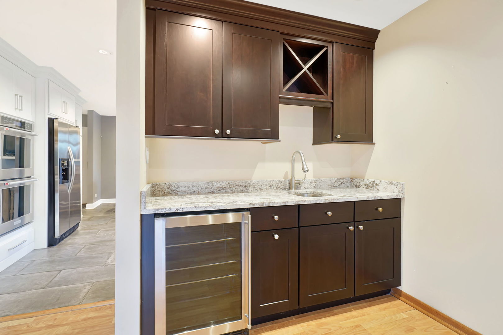 4-n040 Nugent Street Addison, IL 60101 - Photo 10 of 48 a bathroom with a granite countertop sink vanity and mirror