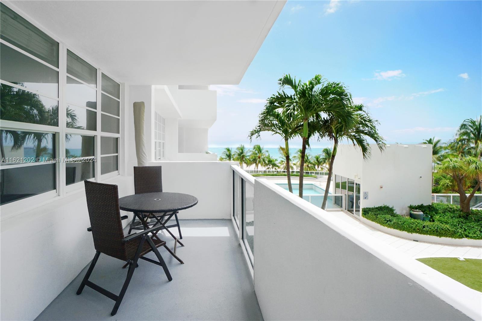 100 Lincoln Road, Unit 436 Miami Beach, FL 33139 - Photo 11 of 11 a view of a chair and table in the balcony