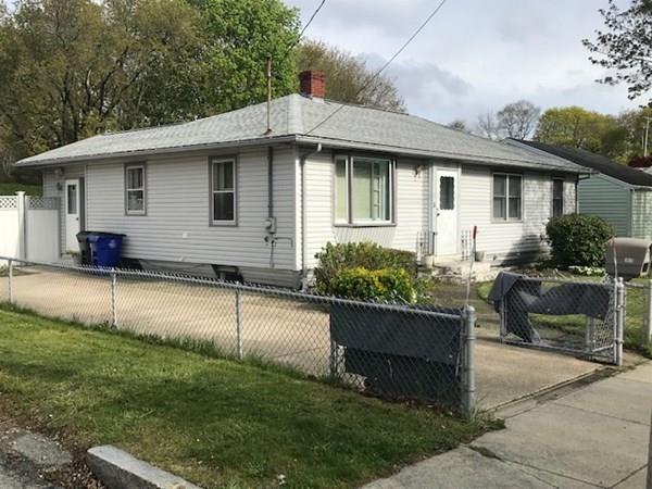 1815 Rodman Street Fall River, MA 02721 - Photo 1 of 2 a view of a house with backyard and sitting area