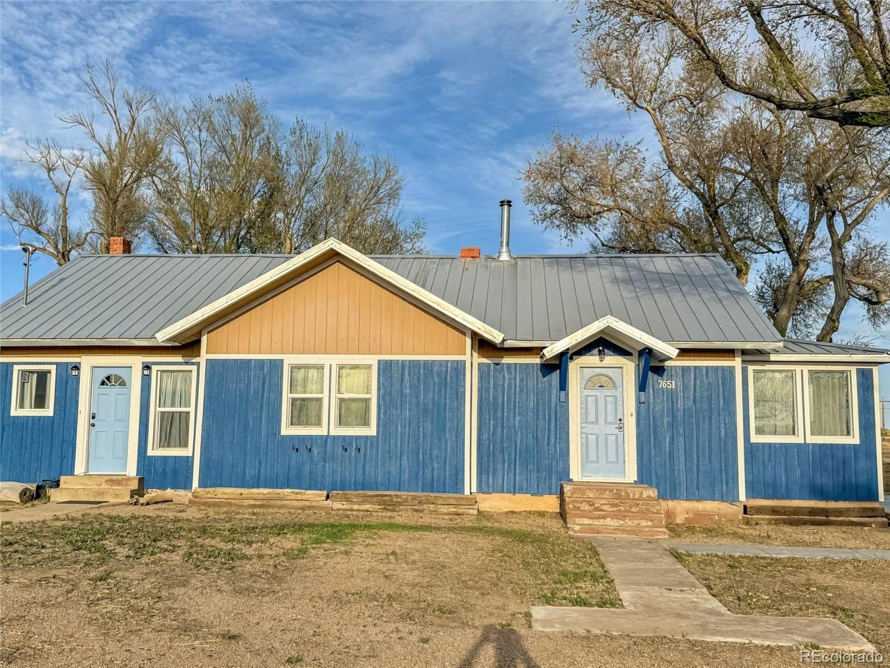 7651 State Highway Las Animas, CO 81054 - Photo 1 of 29 a view of an house with backyard space and balcony
