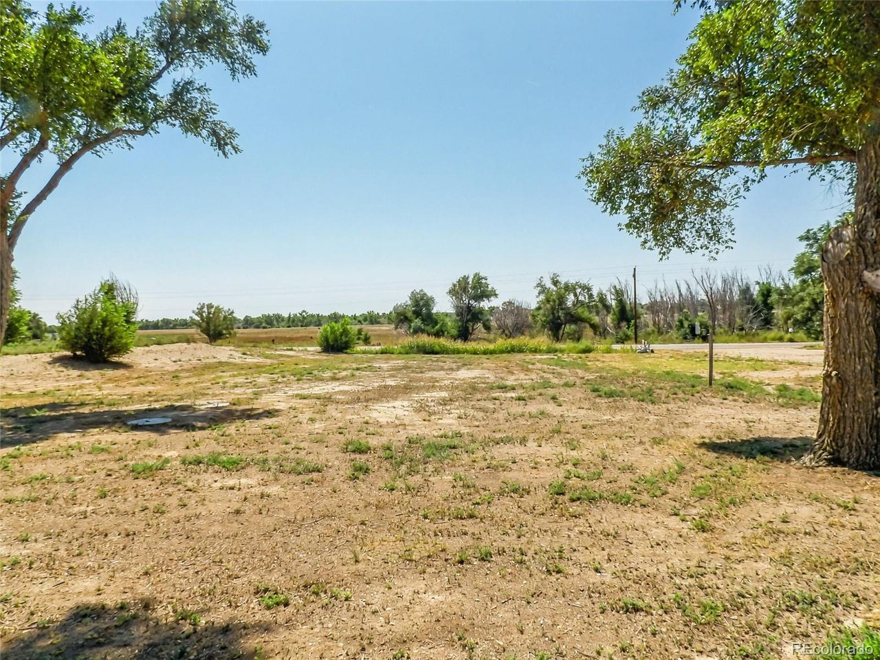 7651 State Highway Las Animas, CO 81054 - Photo 21 of 29 a view of a field with trees