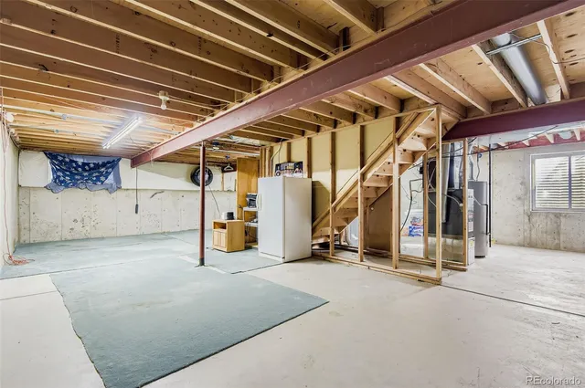 a view of a chairs and table on the deck