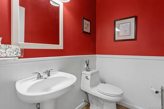 a bathroom with a sink and a toilet