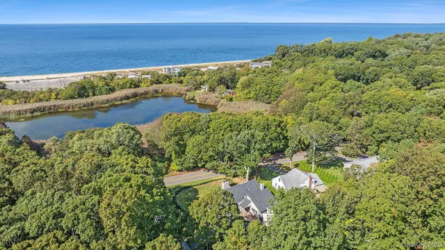 a view of a lake with a yard