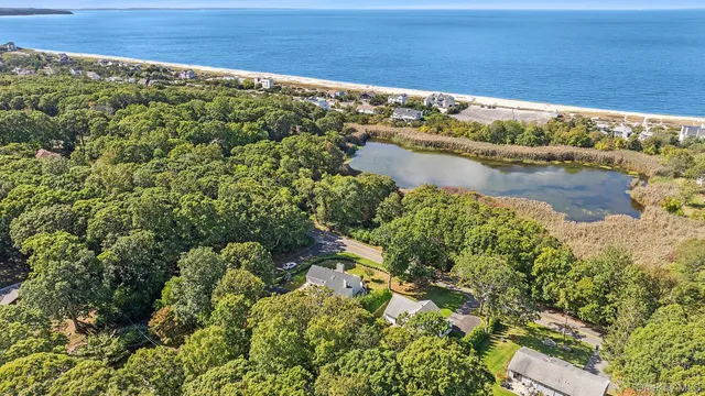 a view of a lake with a yard
