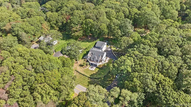 view of a house with a yard