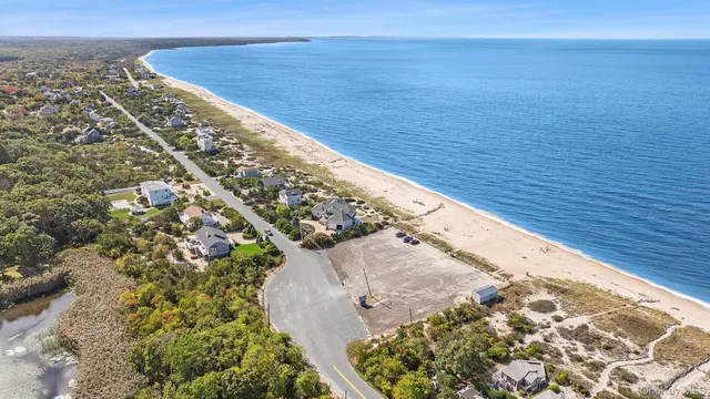 a view of a lake with a yard