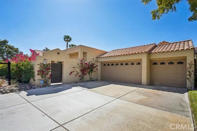a front view of a house with a garage