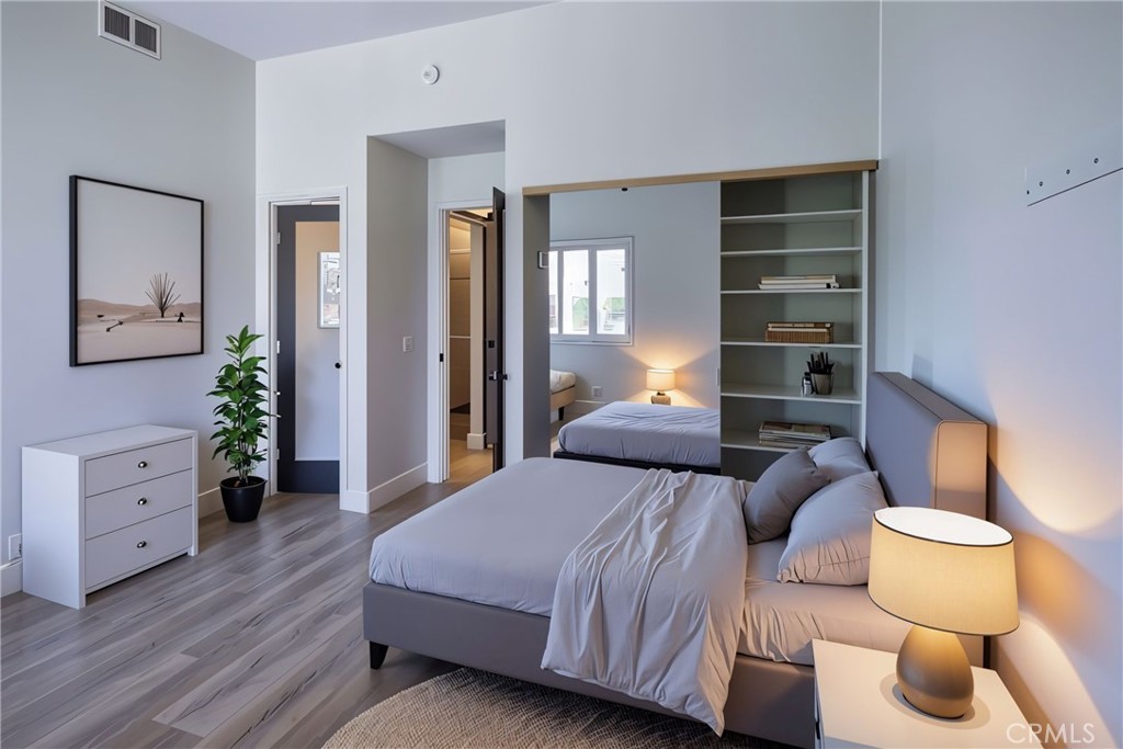 48 Oak Tree Drive Rancho Mirage, CA 92270 - Photo 13 of 31 a bedroom with a bed and a couch