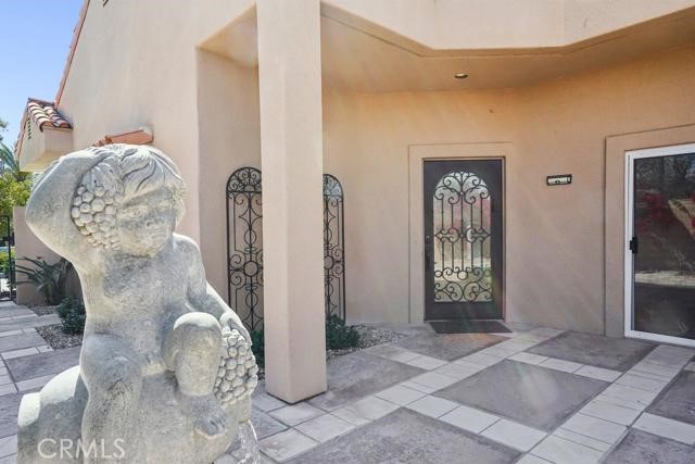 48 Oak Tree Drive Rancho Mirage, CA 92270 - Photo 20 of 31 a view of an entryway with wooden floor