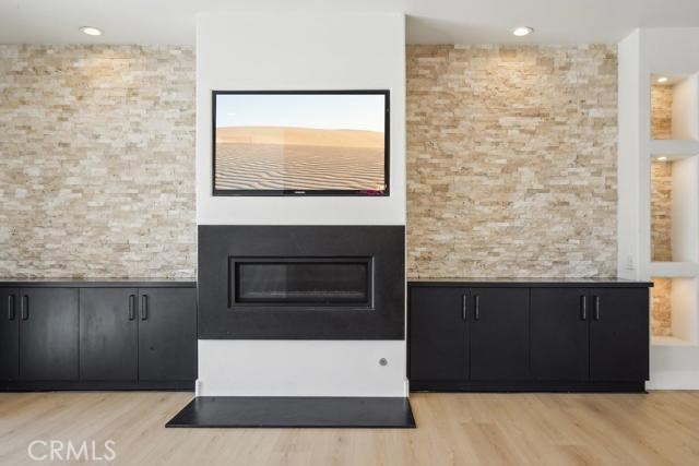 48 Oak Tree Drive Rancho Mirage, CA 92270 - Photo 24 of 31 a building with a bench