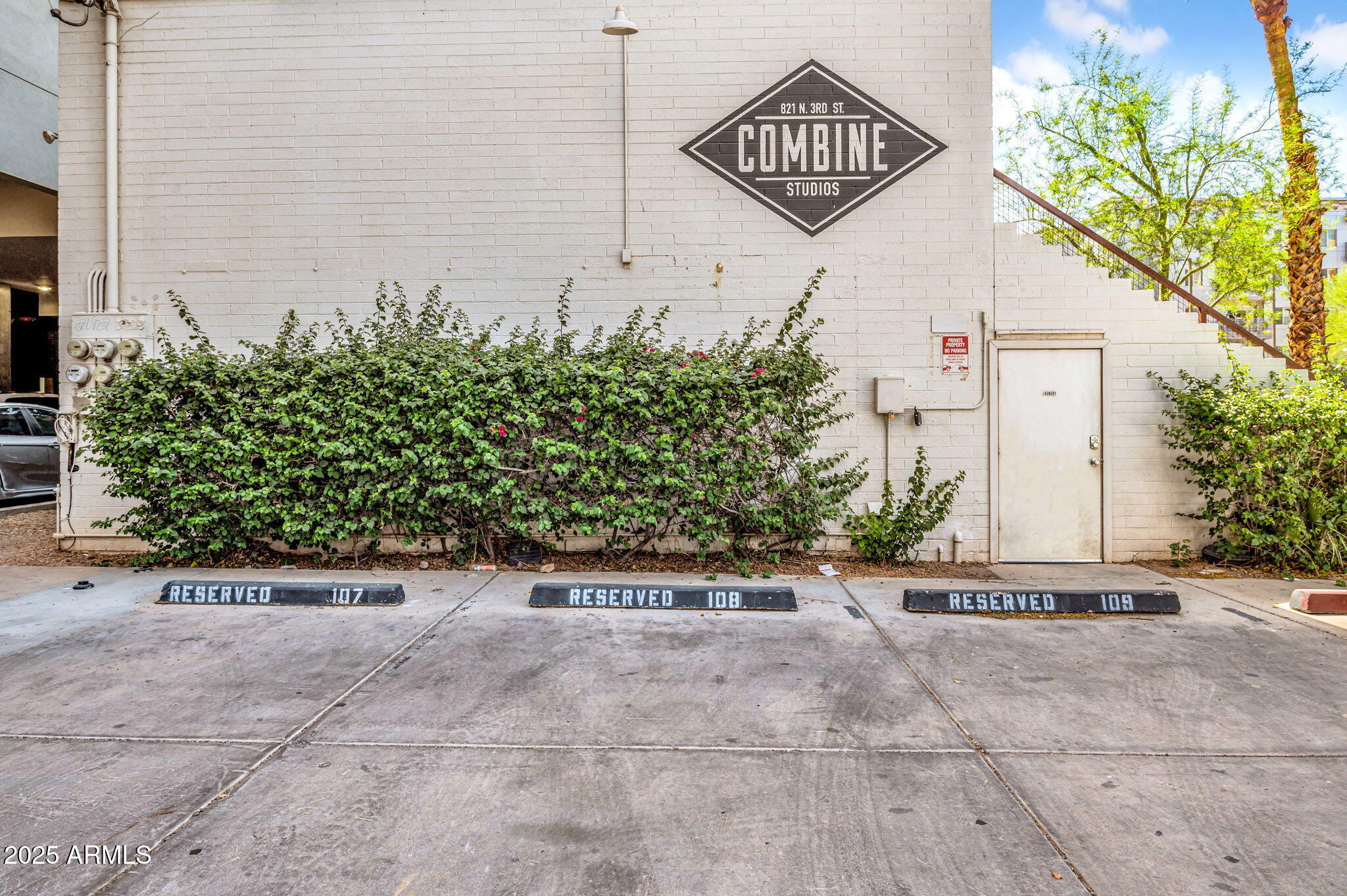821 North 3rd Street, Unit 3 Phoenix, AZ 85004 - Photo 5 of 5 a view of a street with potted plants