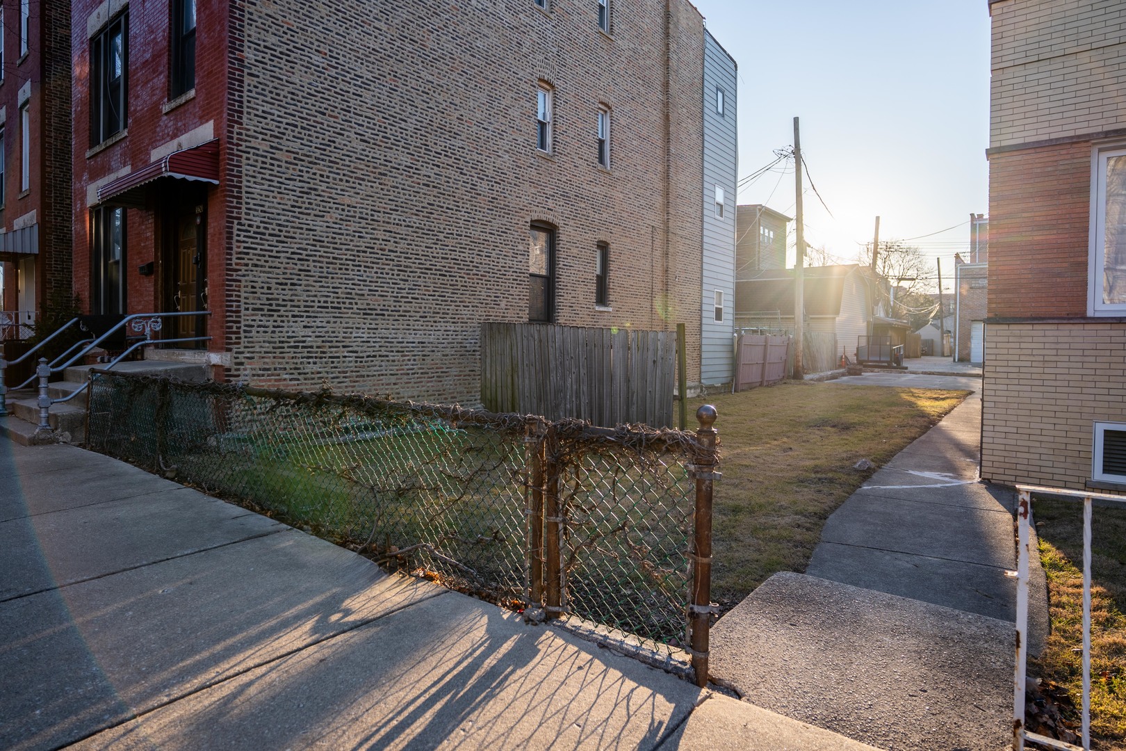 3246 South Wells Street Chicago, IL 60616 - Photo 2 of 4 a view of a street with brick walls