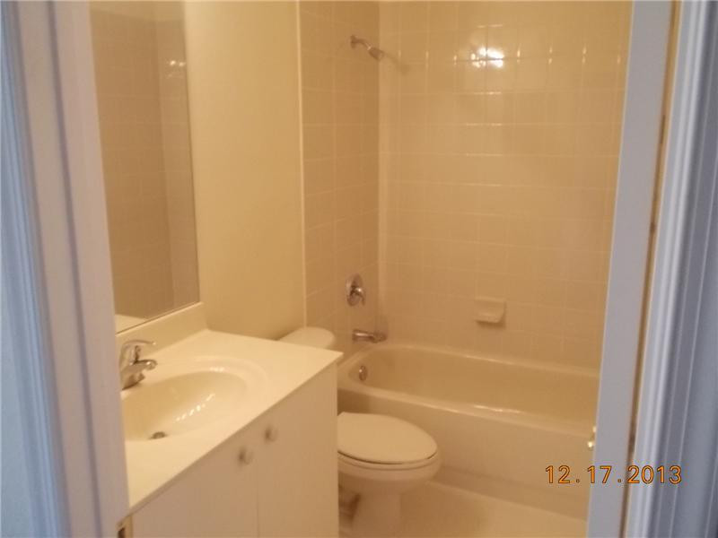 2650 Southwest 84th Terrace, Unit 105 Miramar, FL 33025 - Photo 11 of 12 a bathroom with a granite countertop sink toilet and shower