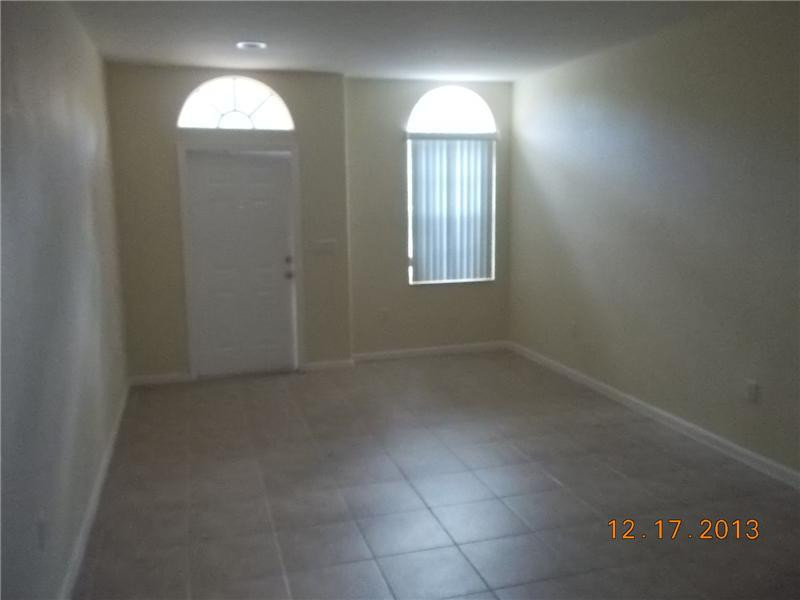 2650 Southwest 84th Terrace, Unit 105 Miramar, FL 33025 - Photo 3 of 12 a view of empty room with window
