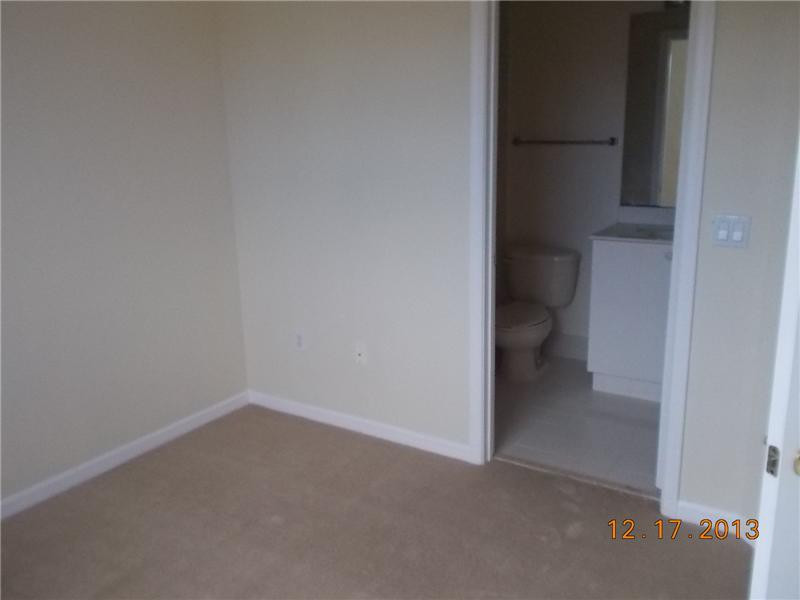 2650 Southwest 84th Terrace, Unit 105 Miramar, FL 33025 - Photo 8 of 12 a view of a room with a hallway