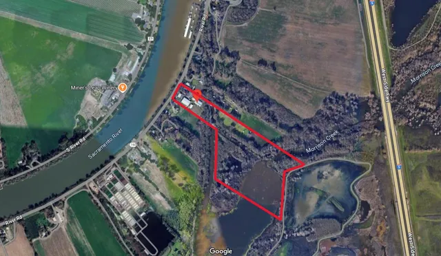 a view of backyard with green space