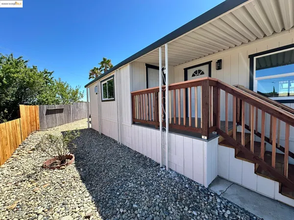 a house view with a backyard