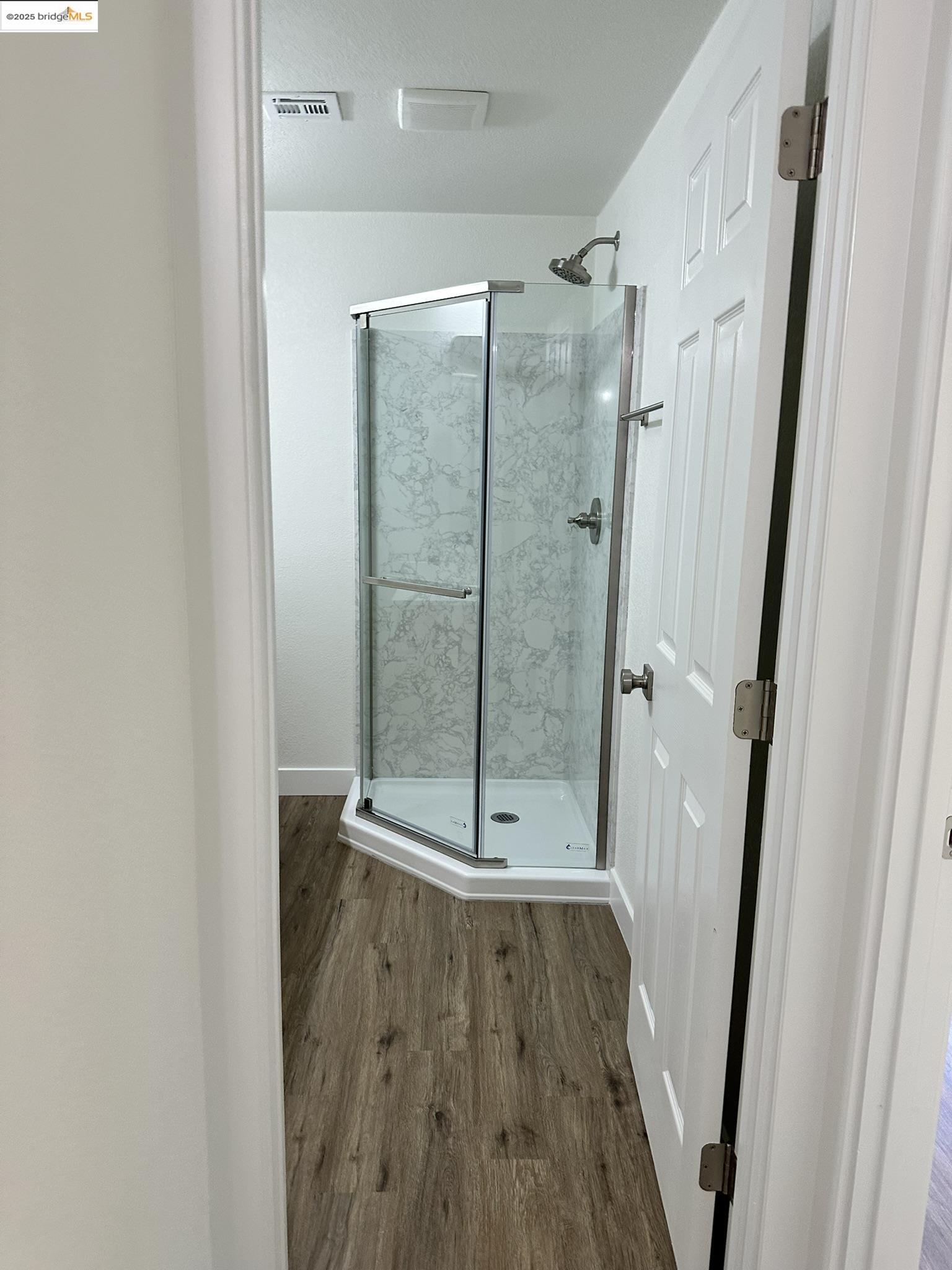 3301 Buchanan Road, Unit 47 Antioch, CA 94509 - Photo 19 of 58 a bathroom with a glass shower door