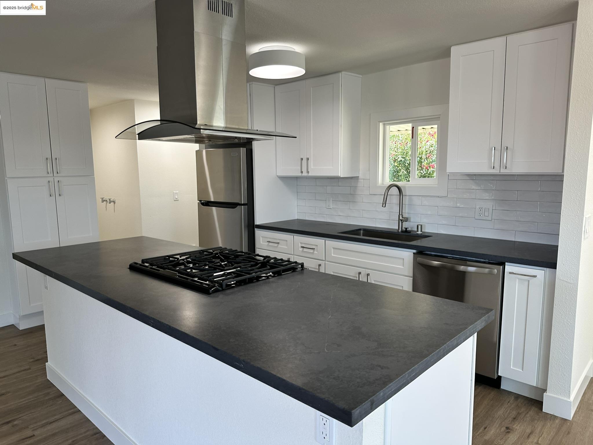 3301 Buchanan Road, Unit 47 Antioch, CA 94509 - Photo 25 of 58 a kitchen with granite countertop stainless steel appliances a sink stove and cabinets