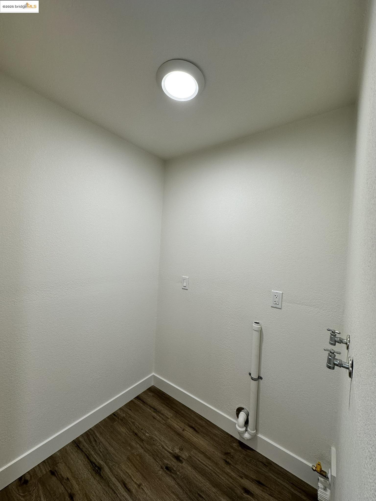 3301 Buchanan Road, Unit 47 Antioch, CA 94509 - Photo 36 of 58 a view of a room with wooden floor and white walls
