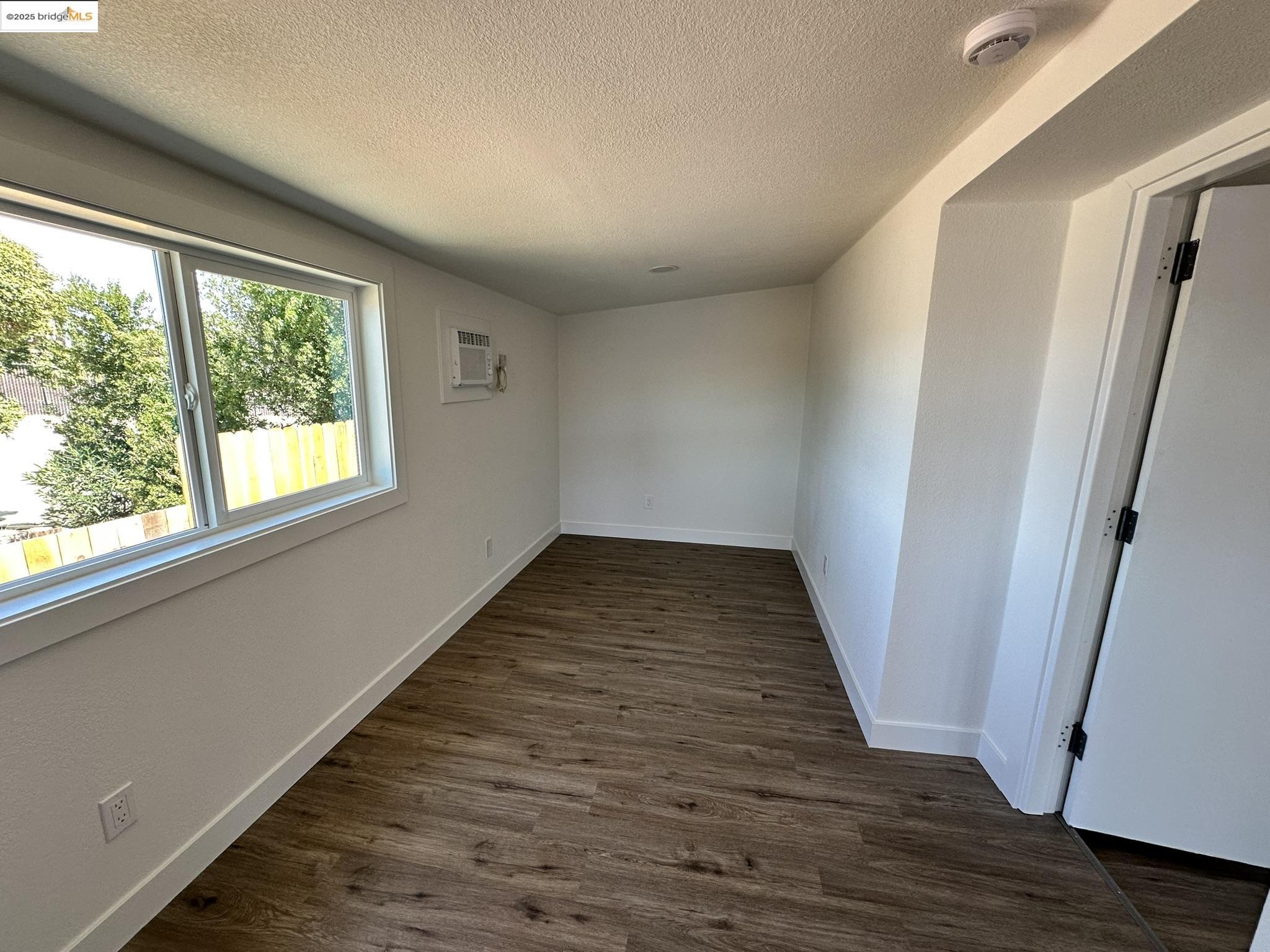 3301 Buchanan Road, Unit 47 Antioch, CA 94509 - Photo 47 of 58 a view of a hallway with wooden floor and staircase