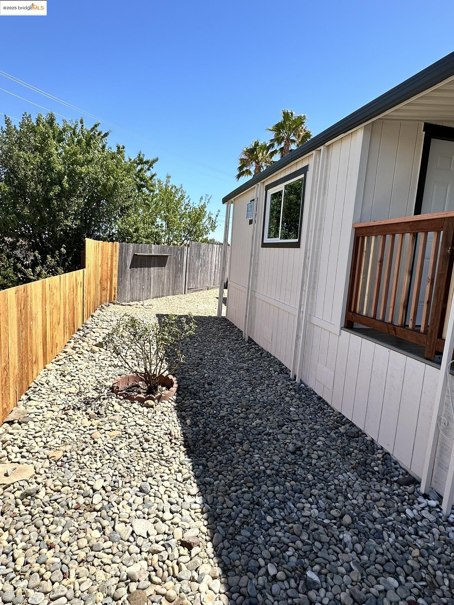 3301 Buchanan Road, Unit 47 Antioch, CA 94509 - Photo 8 of 58 a view of a house with a wooden fence
