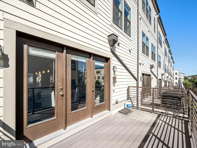 a bathroom with a toilet sink and shower