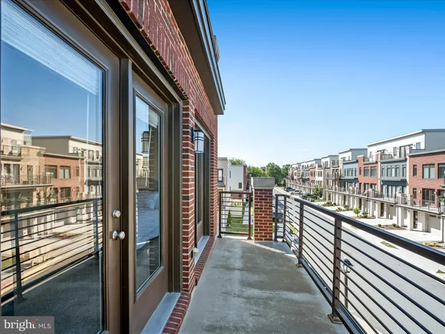 a playing room with furniture toys and a large window