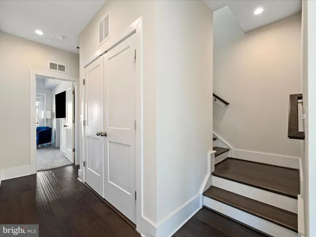 a view of a livingroom with furniture and a window
