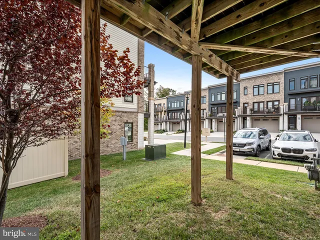 a front view of a building with lot of windows