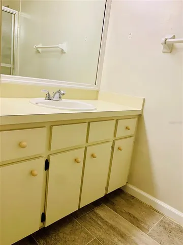 a view of an empty room with a fireplace