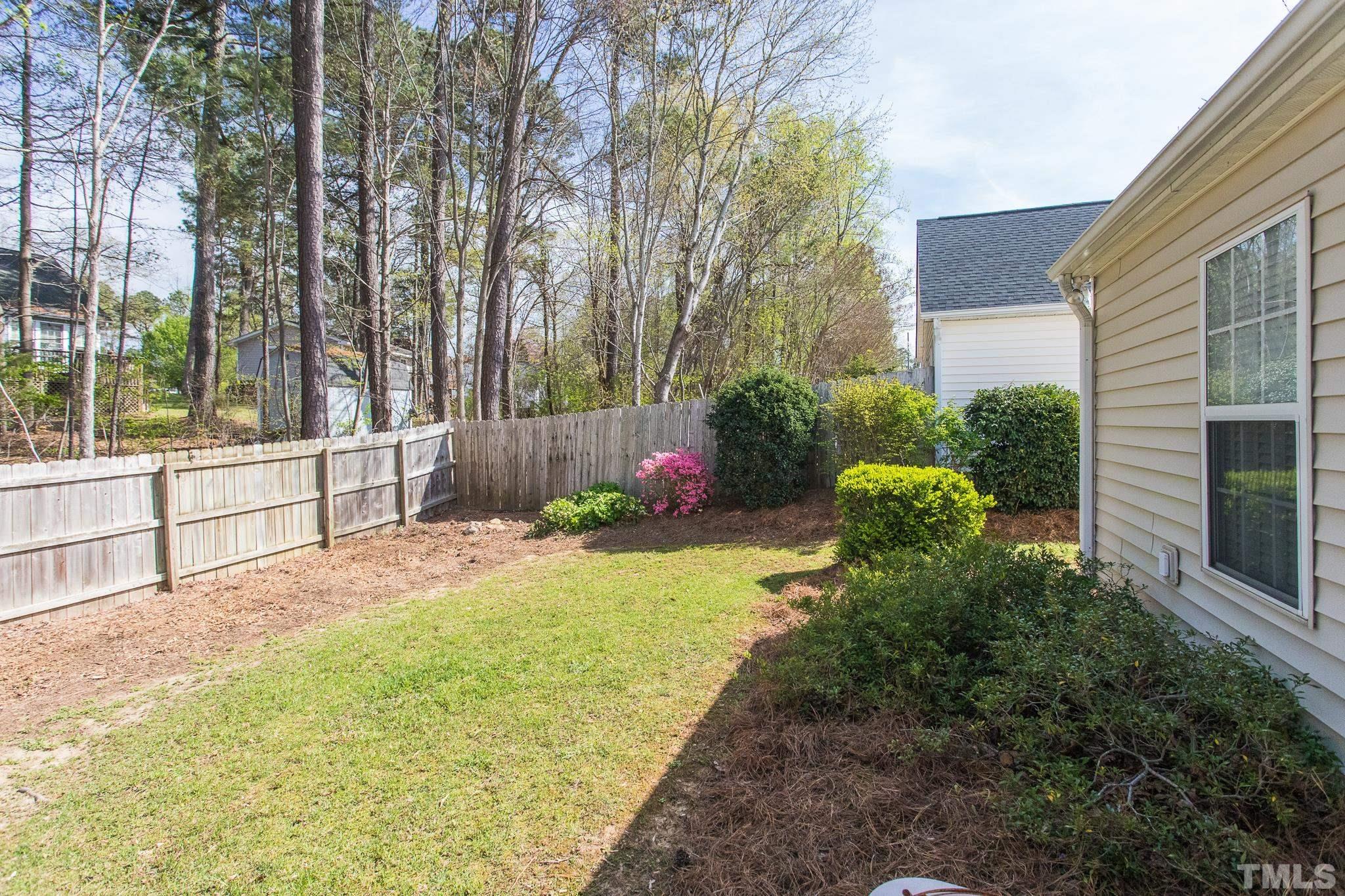 9004 Shallcross Way Raleigh, NC 27617 - Photo 9 of 31 a view of backyard with garden and plants