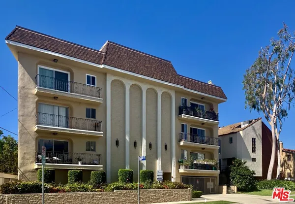 a front view of a building with street view