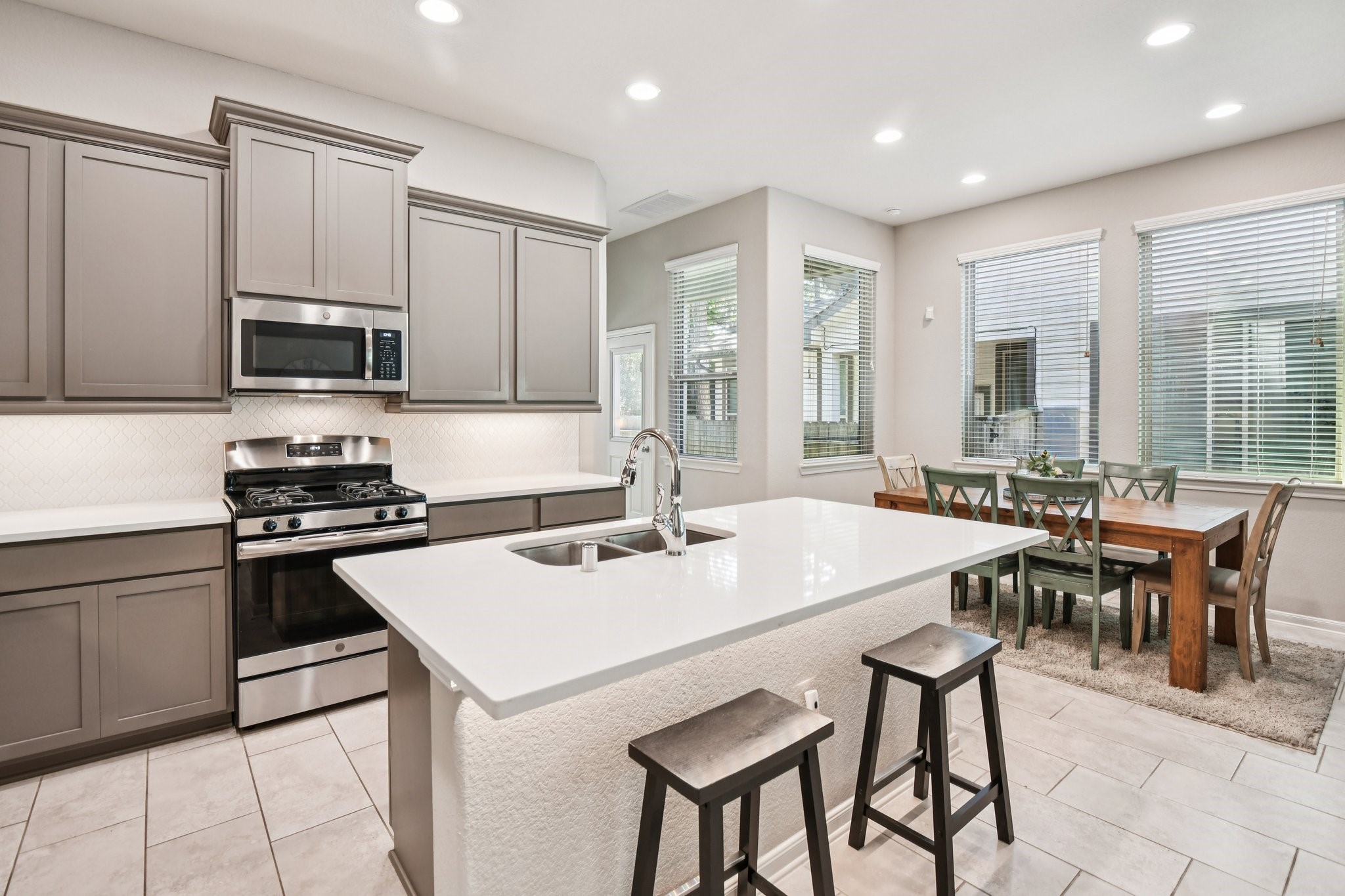230 Biltmore Loop Montgomery, TX 77316 - Photo 15 of 39 Stainless steel appliances and sink compliment this kitchen.