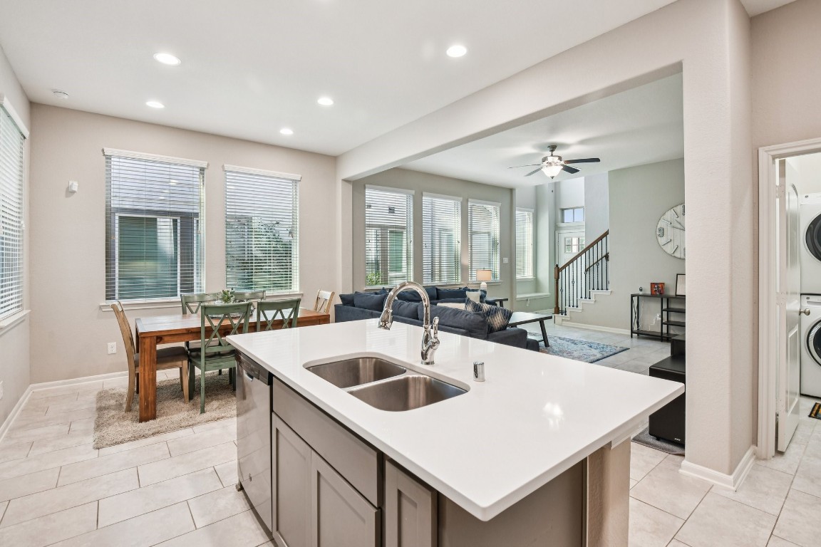 230 Biltmore Loop Montgomery, TX 77316 - Photo 16 of 39 Stainless steel appliances and sink compliment this kitchen.
