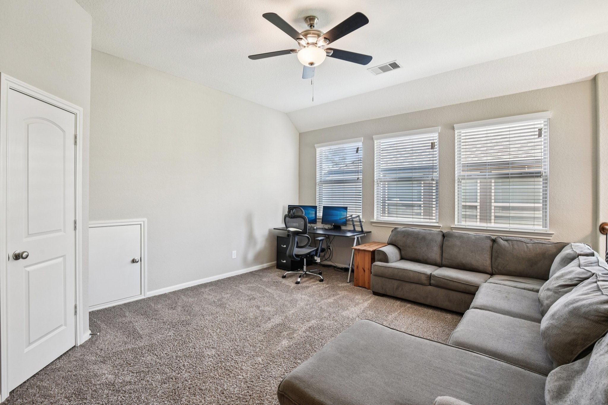 230 Biltmore Loop Montgomery, TX 77316 - Photo 24 of 39 The spacious game room area upstairs could be used as a cozy spot to watch movies or entertain.