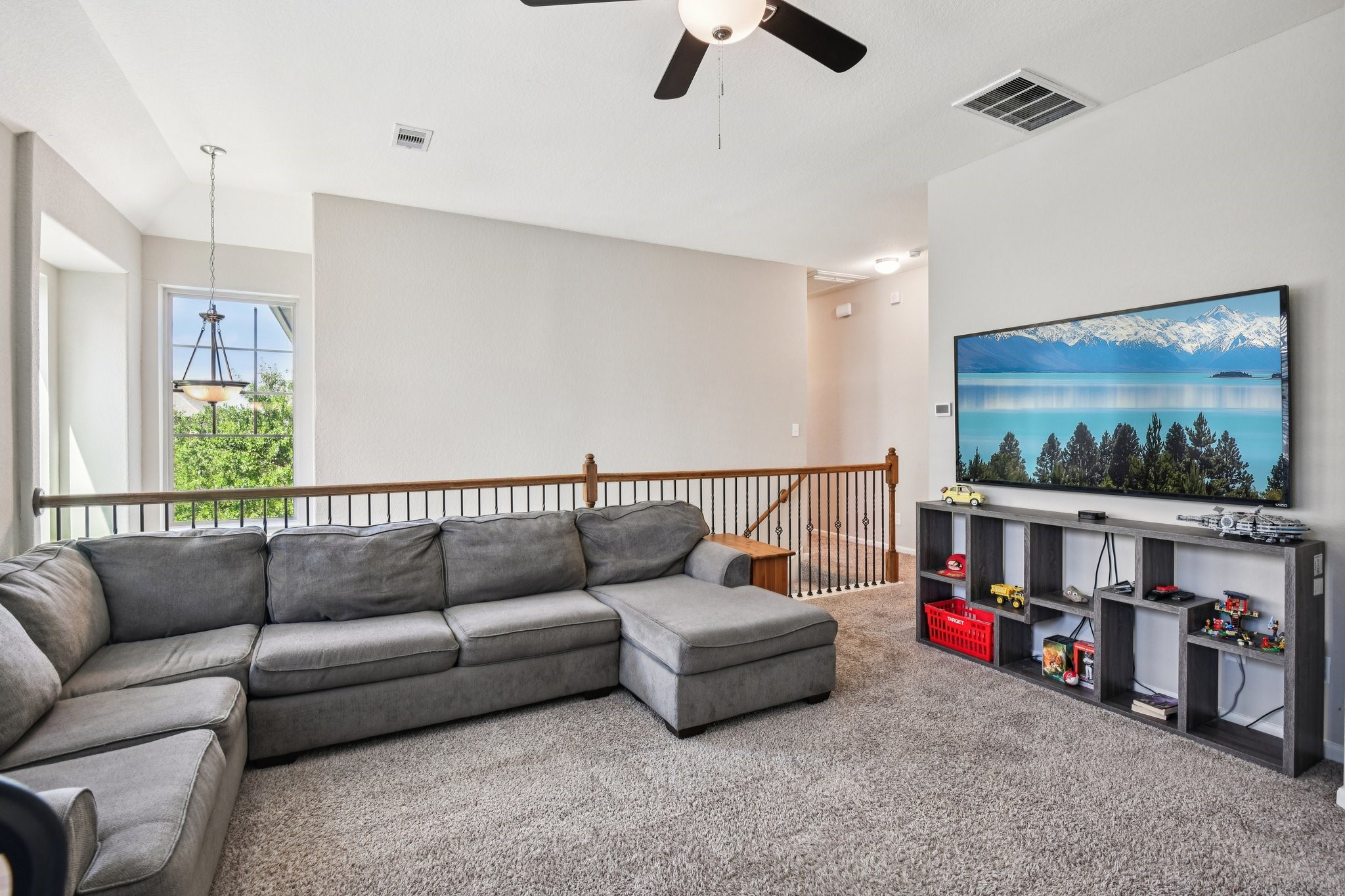 230 Biltmore Loop Montgomery, TX 77316 - Photo 25 of 39 The spacious game room area upstairs could be used as a cozy spot to watch movies or entertain.