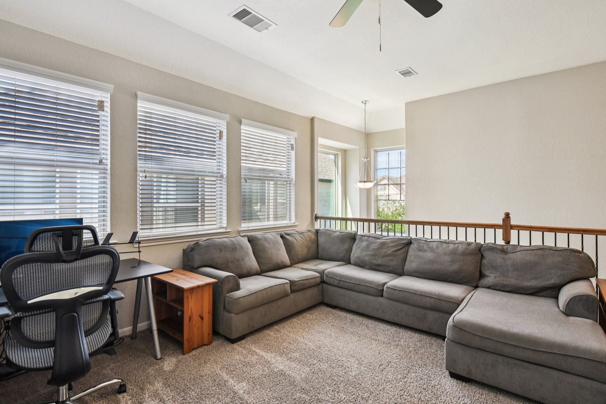 230 Biltmore Loop Montgomery, TX 77316 - Photo 25 of 39 The spacious game room area upstairs could be used as a cozy spot to watch movies or entertain.