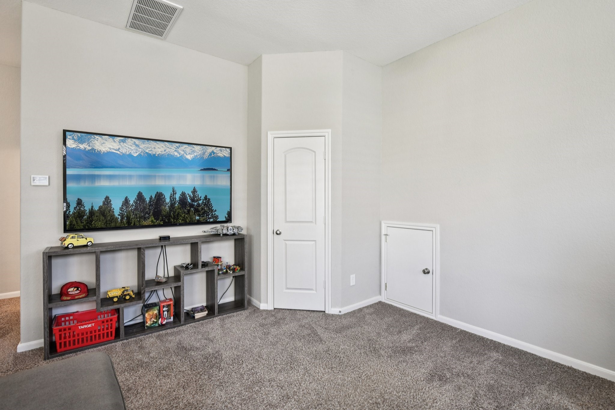 230 Biltmore Loop Montgomery, TX 77316 - Photo 26 of 39 Game room includes a closet for storage and access to the attic.