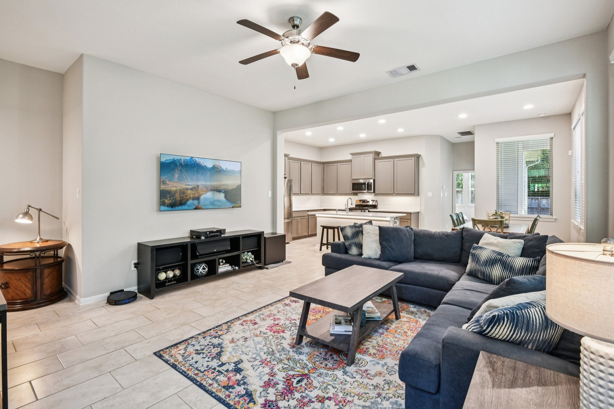 230 Biltmore Loop Montgomery, TX 77316 - Photo 5 of 39 Living area is open to both the kitchen and dining areas - perfect for entertaining! Half bath is tucked to the left on your way to the garage.
